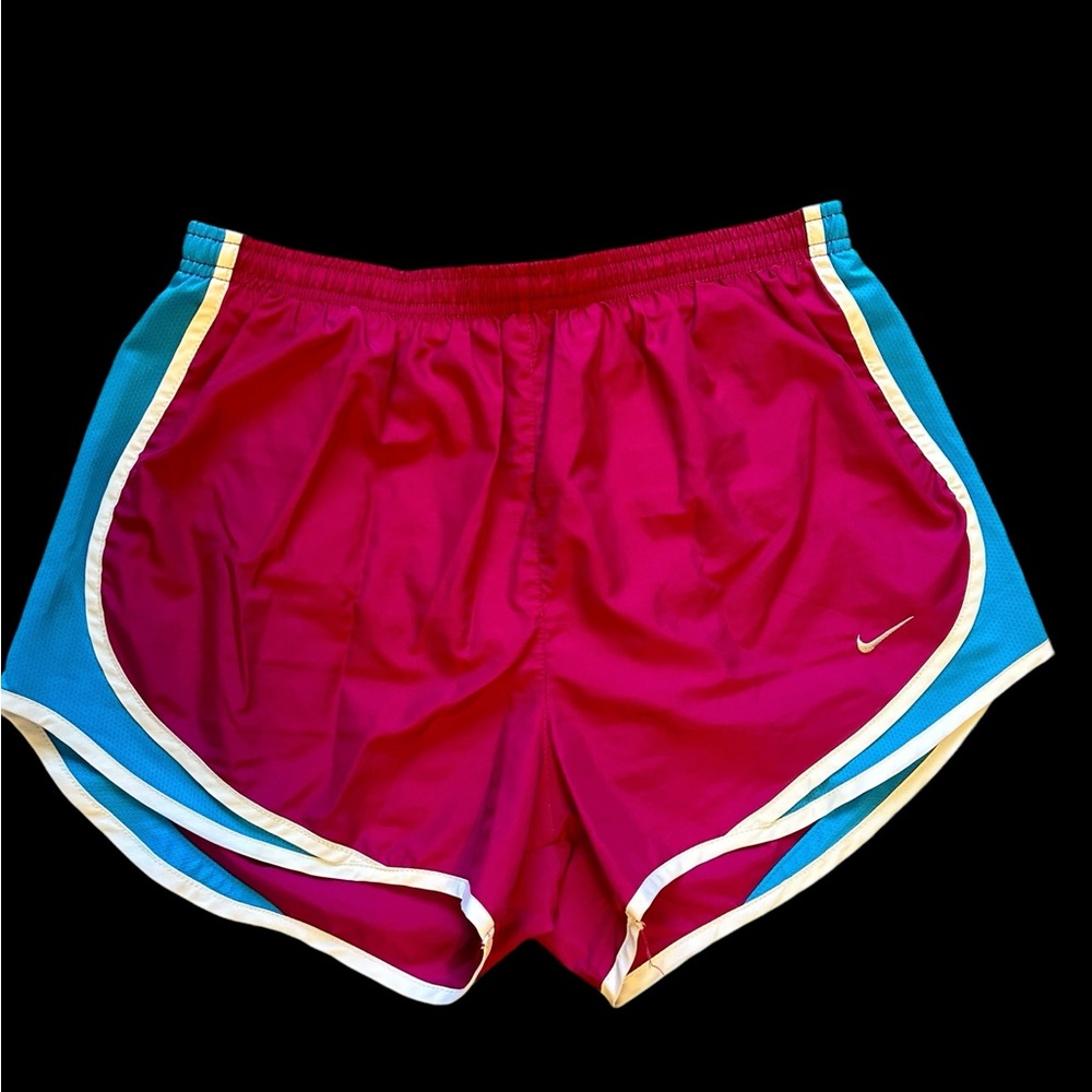 Vintage Y2K women’s short running shorts pink blue and white Nike size medium